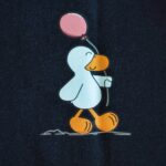Chubby Duffy with Balloon (Unisex Short Sleeve Graphic T-Shirt) - zoomed in photo